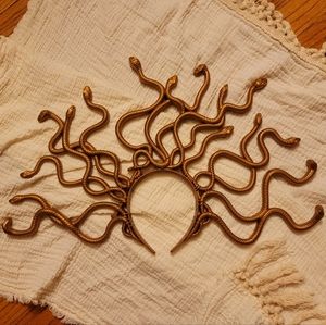 Gold toned Medusa headpiece